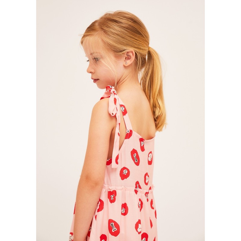 Vestido de niña estampado en color rosa con ilustración de monitos en rojo y blanco