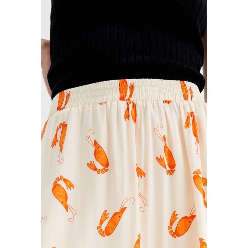 FALDA MIDI CON CINTURA ELÁSTICA Y ANIMAL PRINT.