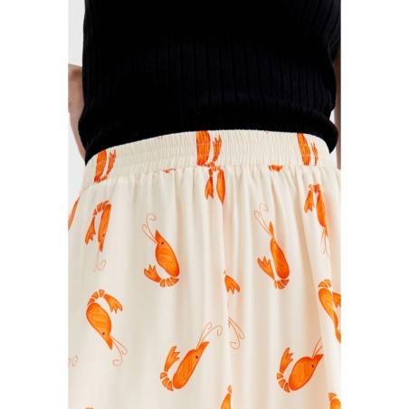 FALDA MIDI CON CINTURA ELÁSTICA Y ANIMAL PRINT.