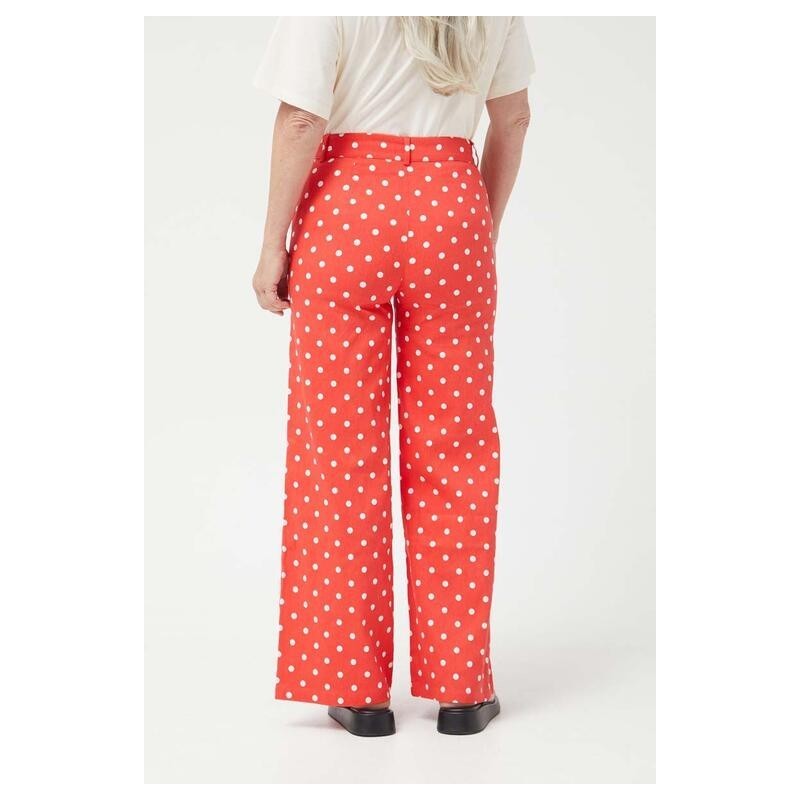 PANTALÓN VAQUERO RECTOS LUNARES ROJO.