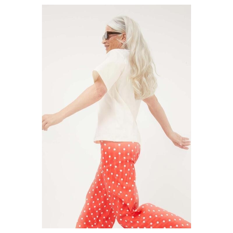 PANTALÓN VAQUERO RECTOS LUNARES ROJO.