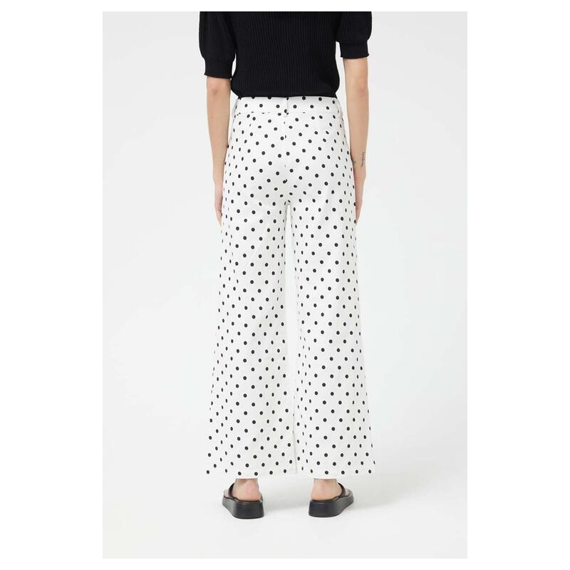 PANTALÓN VAQUERO RECTOS LUNARES BLANCO.