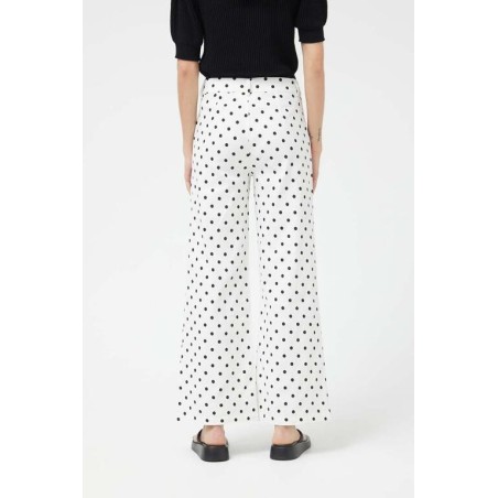 PANTALÓN VAQUERO RECTOS LUNARES BLANCO.