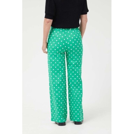 PANTALÓN VAQUERO RECTO LUNARES VERDE.