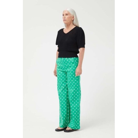 PANTALÓN VAQUERO RECTO LUNARES VERDE.