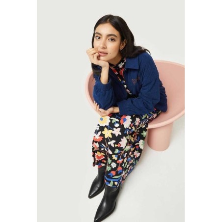 Vestido largo de punto estampado floral grande.