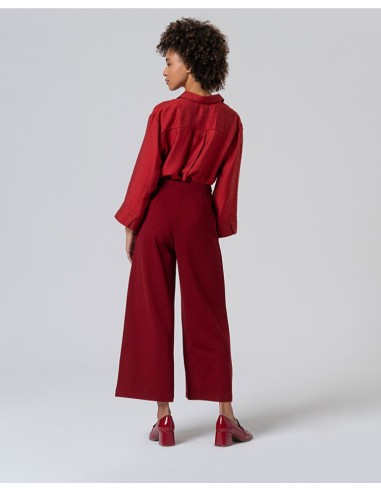 PANTALÓN AMPLIO CON DETALLE BOTONES EN CINTURA.