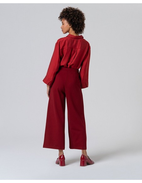 PANTALÓN AMPLIO CON DETALLE BOTONES EN CINTURA.