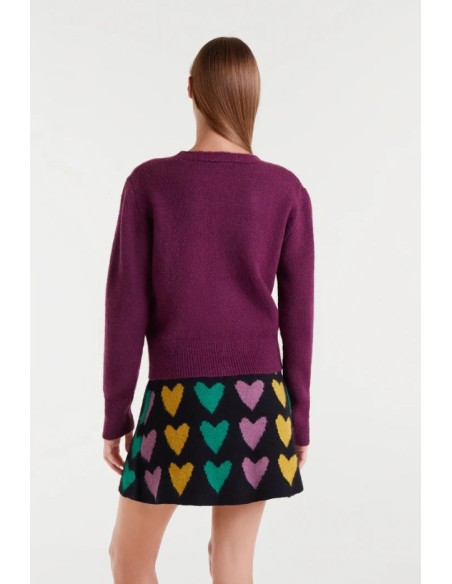 CHAQUETA DE PUNTO,DETALLES EN BOTONES.