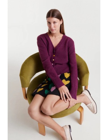 CHAQUETA DE PUNTO,DETALLES EN BOTONES.