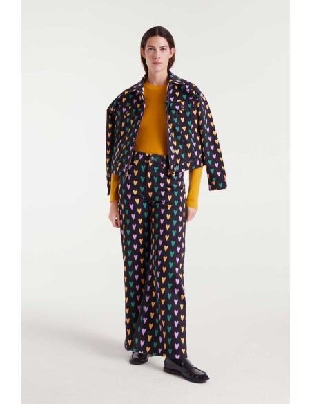 PANTALÓN VAQUERO DE TEJIDO DENIM ELÁSTICO CON ESTAMPADO CÚPIDO LINES.