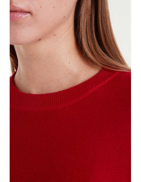 JERSEY DE PUNTO EVASÉ CON CUELLO REDONDO Y MANGA LARGA.