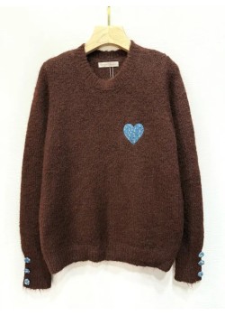 JERSEY DE PUNTO MANGA LARGA CON 3 BOTONES EN LOS PUÑOS.