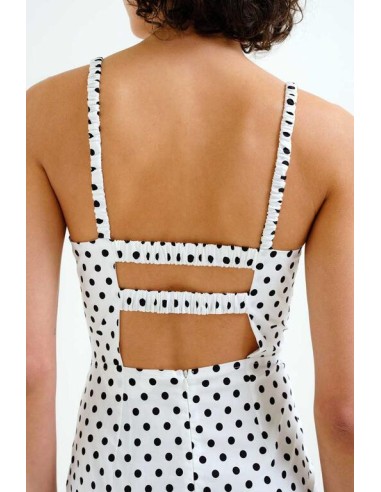 VESTIDO MIDI CON ESTAMPADO DE PUNTOS NEGROS.