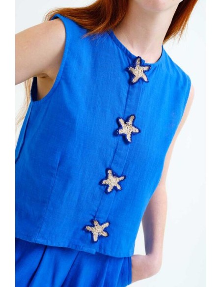 TOP 100% ALGODÓN CON APLIQUE DE ESTRELLAS.