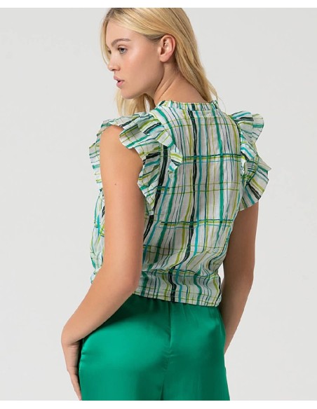 BLUSA CON VOLANTES EN MANGA Y CORDÓN EN BAJO.