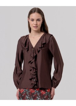 BLUSA CON VOLANTE EN CASCADA.